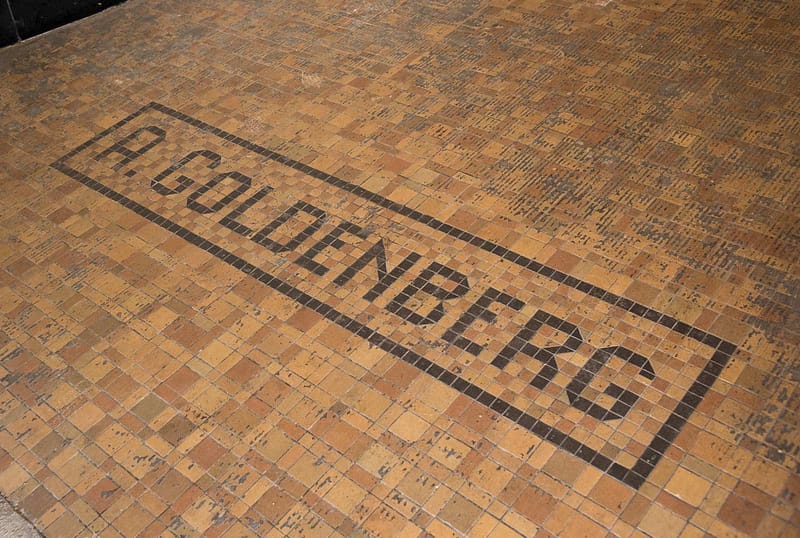 Jarfly Brewery entrance tile with the word Goldenbergs in the pattern.