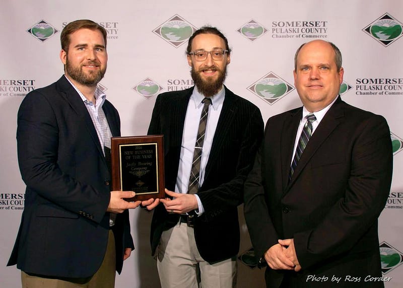 Delaney Stephens, left, and Daniel Stroud, owners of Jarfly Brewing Company, with Somerset-Pulaski County Chamber of Commerce President Seth Atwell